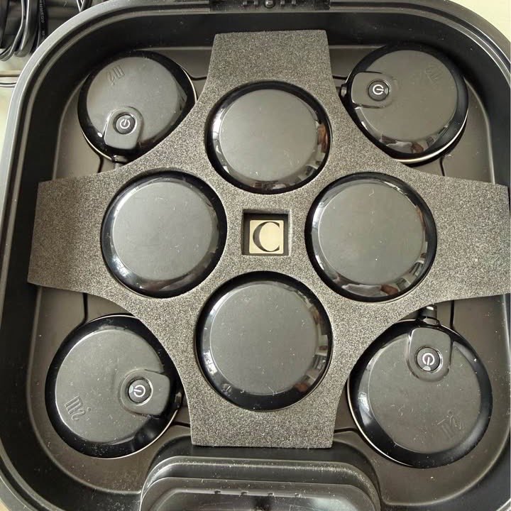 Plateau de rangement du Compex SP 6.0 avec ses modules de stimulation sans fil