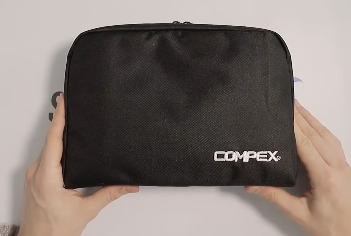 Sacoche de transport en tissu noir du Compex Sport Elite avec logo Compex brodé