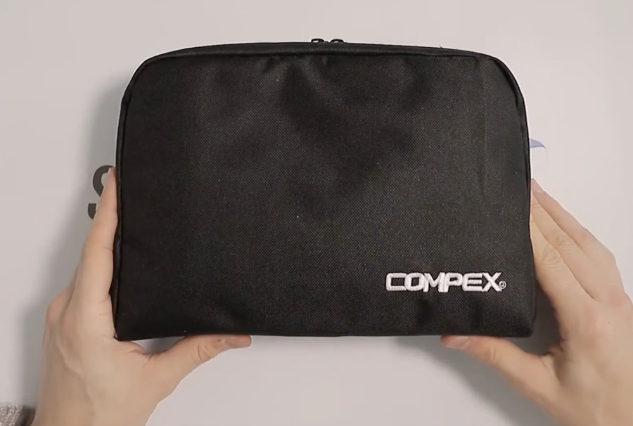 Sacoche de transport en tissu noir du Compex Sport Elite avec logo Compex brodé
